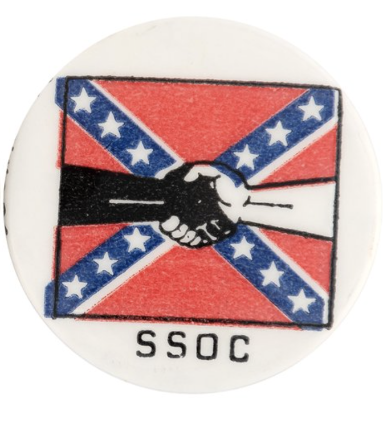 The Southern Student Organizing Committee's logo, black-and-white hands shaking over the Confederate battle flag.
