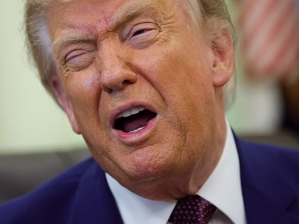 WASHINGTON, DC - JUNE 03: U.S. President Donald Trump reacts during an event in the Oval Office of the White House on June 03, 2026 in Washington, DC. Trump signed executive orders related to strengthening customs enforcement and reforms to federal work laws.