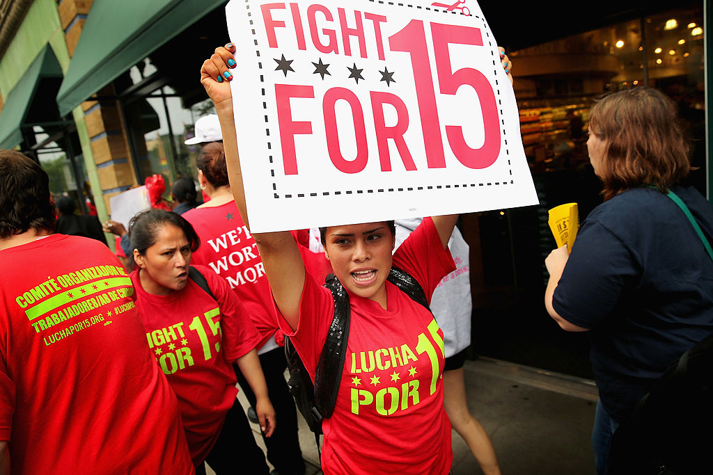 Whole Foods Market employees and union activists protest outside a Whole Foods Market store on July 31, 2013 in Chicago, Illinois.