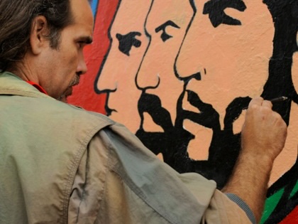 The painting of a fresco on a Havana wall.
