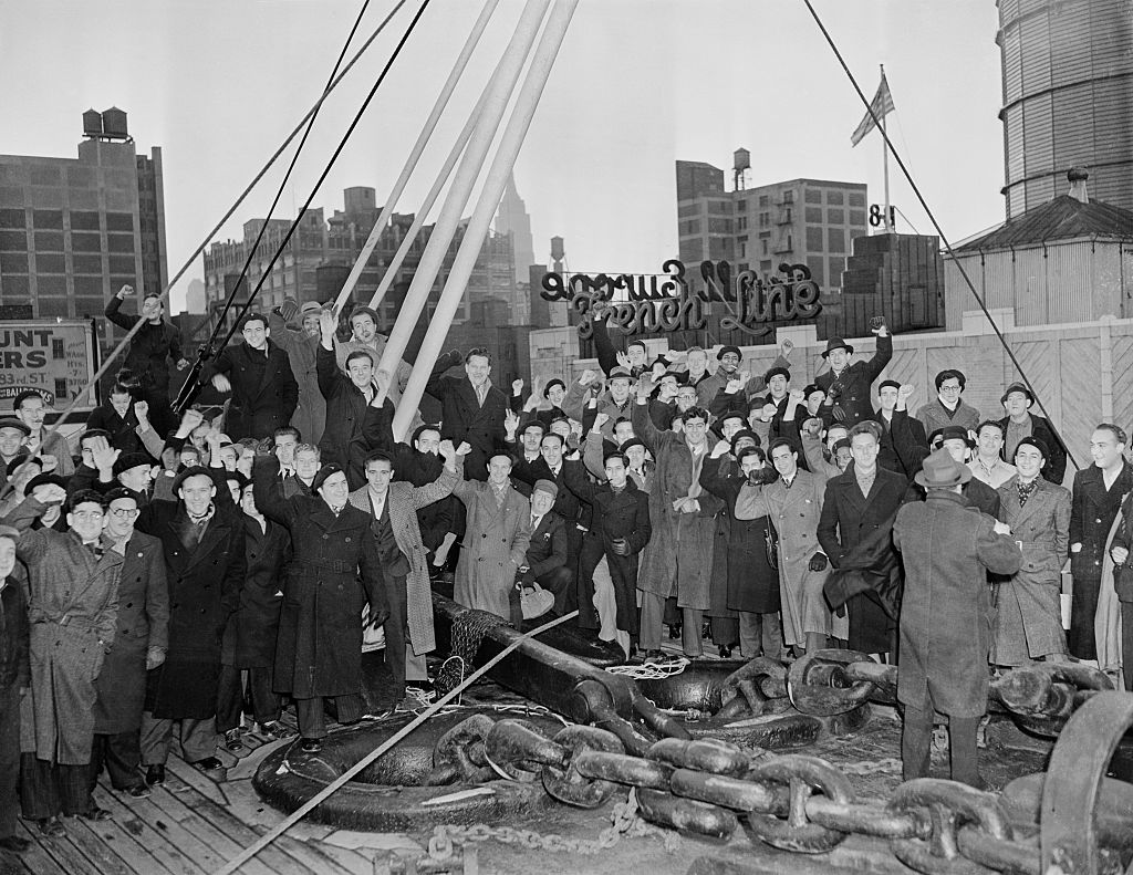 Some of the 149 members of the Abraham Lincoln Brigade, just after they arrived in New York on the S.S. Paris, December 15, 1939, from service in the Spanish Civil War.