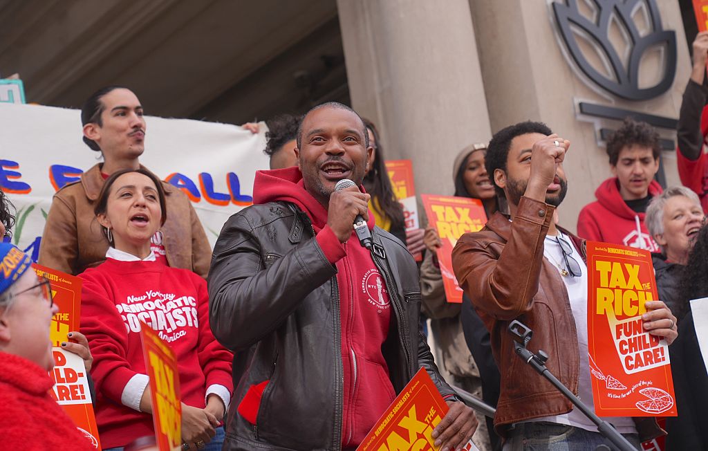 NYC-DSA hold a rally in Union Square marking the start of a campaign to tax the rich and win universal childcare on November 16, 2025, in New York City.