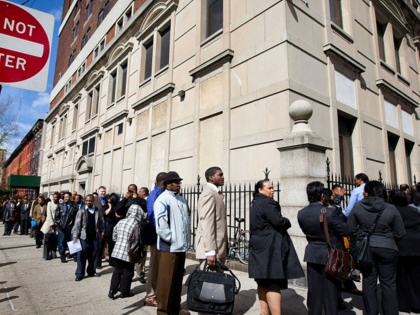 Job seekers wait in line to enter the Dr King career fair in Brooklyn on April 12, 2012.