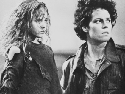 Sigourney Weaver and Carrie Henn are photographed on the set of the film Aliens.