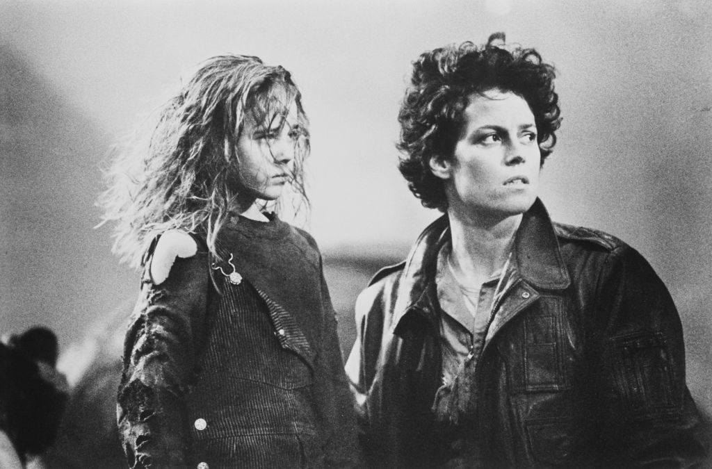 Sigourney Weaver and Carrie Henn are photographed on the set of the film Aliens.