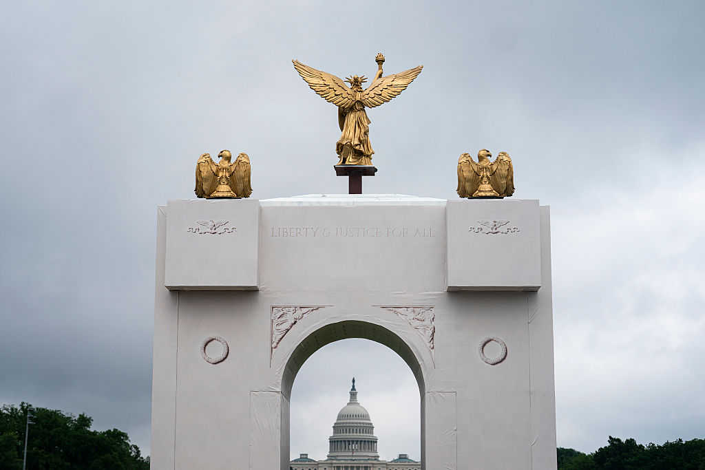 The US Capitol stands behind a replica of the planned Triumphal Arch on the fourth day of the "Great American State Fair" on the National Mall on June 28, 2026, in Washington, DC.