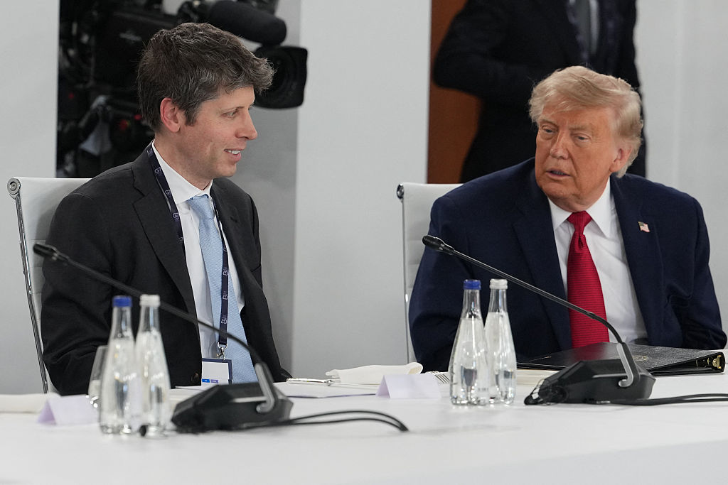 Donald Trump and Sam Altman interact during a meeting of G7 members in Evian, France, on June 17, 2026.