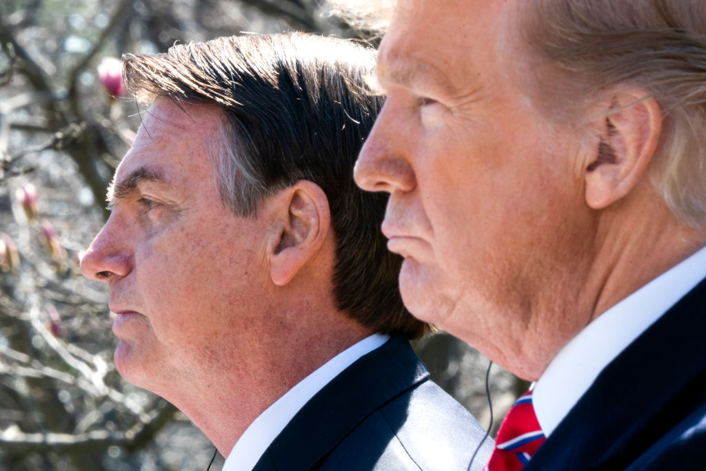 Donald Trump and Jair Bolsonaro attend a joint news conference on March 19, 2019, in Washington, DC.