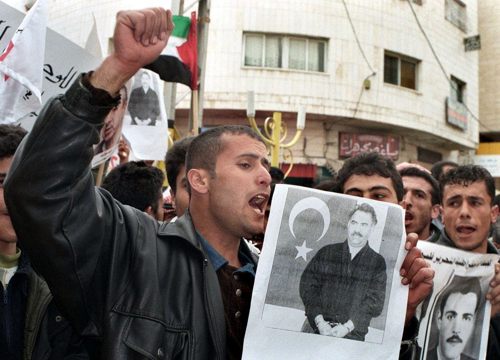 Palestinian members of the Democratic Front for the Liberation of Palestine demonstrate in the West Bank town of Jenin on February 20, 1999, against the arrest of Kurdistan Workers’ Party leader Abdullah Öcalan.