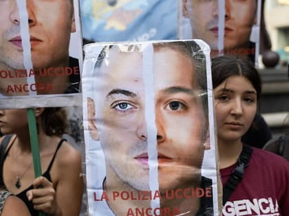 People gather in Naples, Italy, during a demonstration to demand justice for Abderrahim Fakir. 