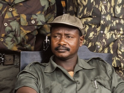 Ugandan President Yoweri Museveni sits flanked by guards shortly after seizing power in 1986.