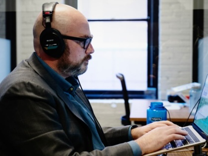 Pundit Matt Yglesias works at his computer. 