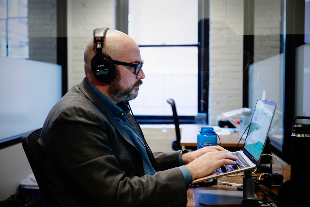 Pundit Matt Yglesias works at his computer. 