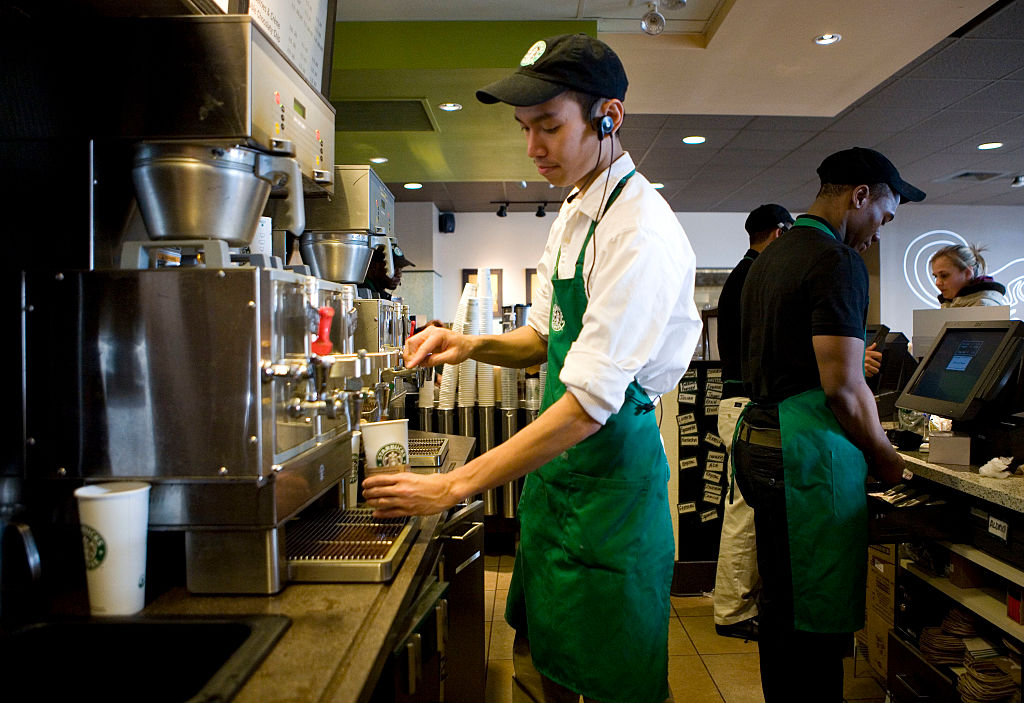 A barista prepares a drink at a Starbucks location in New York on January 13, 2010.