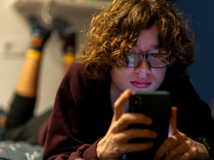Teenager Bruno through social media on his phone in Madrid, Spain, on February 4, 2026.