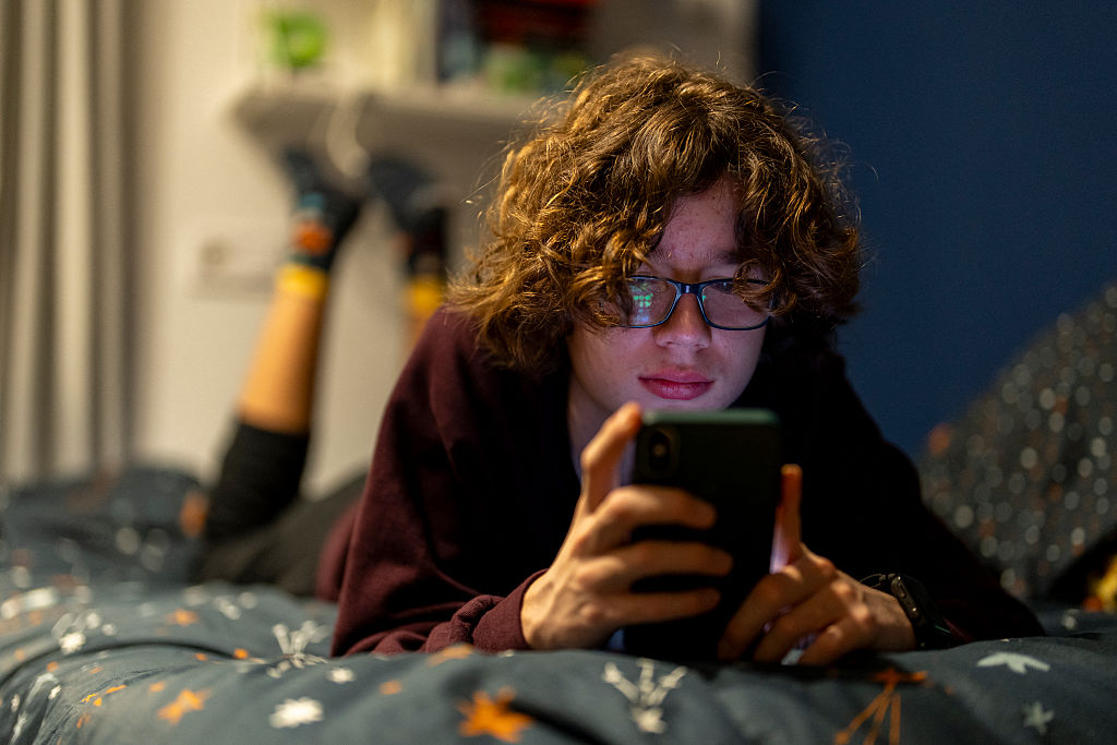 Teenager Bruno through social media on his phone in Madrid, Spain, on February 4, 2026. 