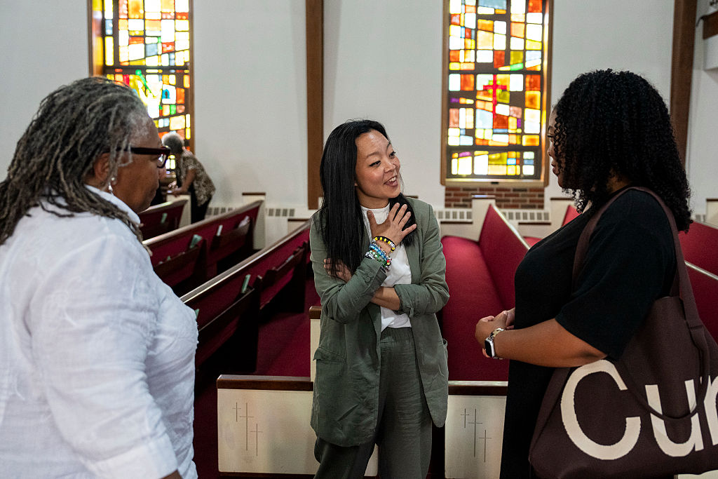 Francesca Hong meets parishioners at the St Paul Baptist Church in Racine, Wisconsin on July 19, 2026.
