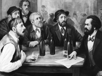An illustration of Karl Marx speaking to a group of men at a tavern.