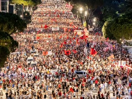 A drone view shows thousands of demonstrators gathered in central Tirana during the thirty-fifth consecutive day of protests against a proposed luxury tourism development project linked to international investors, including Jared Kushner, in Tirana, Albania, on July 4, 2026.