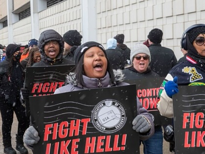 Letter carriers rally at the Detroit post office on February 22, 2026, as negotiations continue for a new labor contract.