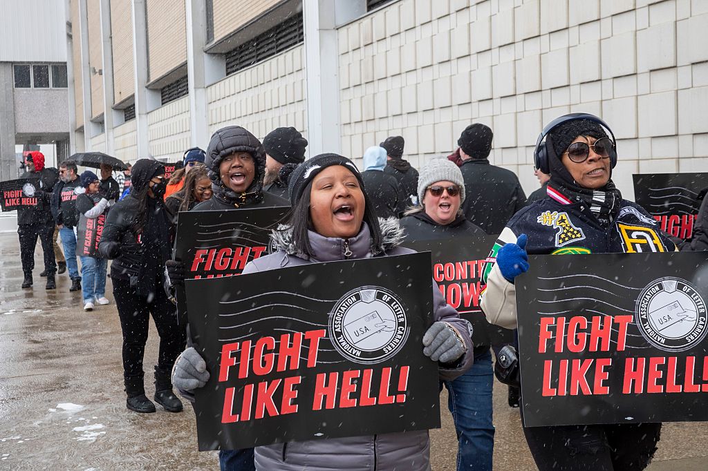 Letter carriers rally at the Detroit post office on February 22, 2026, as negotiations continue for a new labor contract.