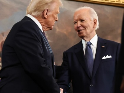 Donald Trump greets Joe Biden as he arrives for inauguration ceremonies in the Rotunda of the US Capitol on January 20, 2025. 