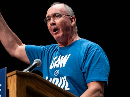 UAW President Shawn Fain speaks at The People V. The Powerful rally at the Detroit Opera House on July 18, 2026, in Detroit, Michigan.