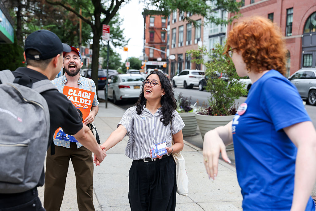 State Representative Claire Valdez, a Democrat from New York and US House candidate, center, speaks with voters outside a polling location at PS 84 during a primary election in New York City on Tuesday, June 23, 2026.