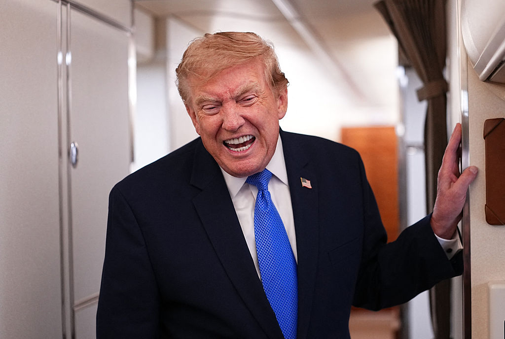 Donald Trump speaks to the press aboard Air Force One on August 2, 2026.
