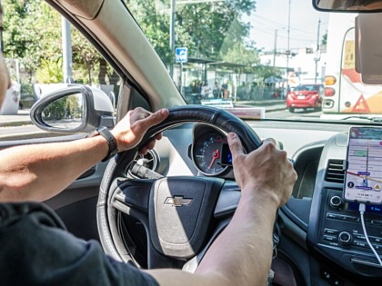 The interior of a vehicle of an Uber driver, Benito Juarez, in Mexico City.