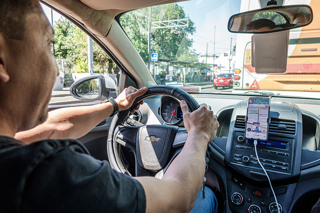 The interior of a vehicle of an Uber driver, Benito Juarez, in Mexico City.