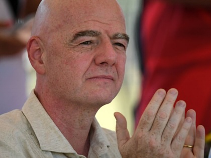 FIFA President Gianni Infantino applauds during a visit to a sports complex in Cali, Colombia, on August 7, 2026.