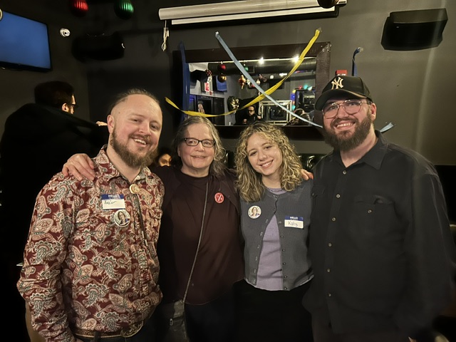 Kate Bronfenbrenner, second from left, at a retirement party organized by former students.