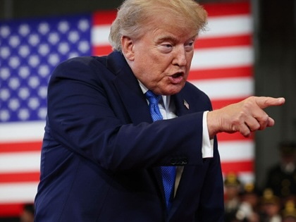 President Donald Trump arrives to deliver remarks at the David S. Mack Center for Training and Intelligence on August 14, 2026, in Garden City, New York. (Samuel Corum / Getty Images)