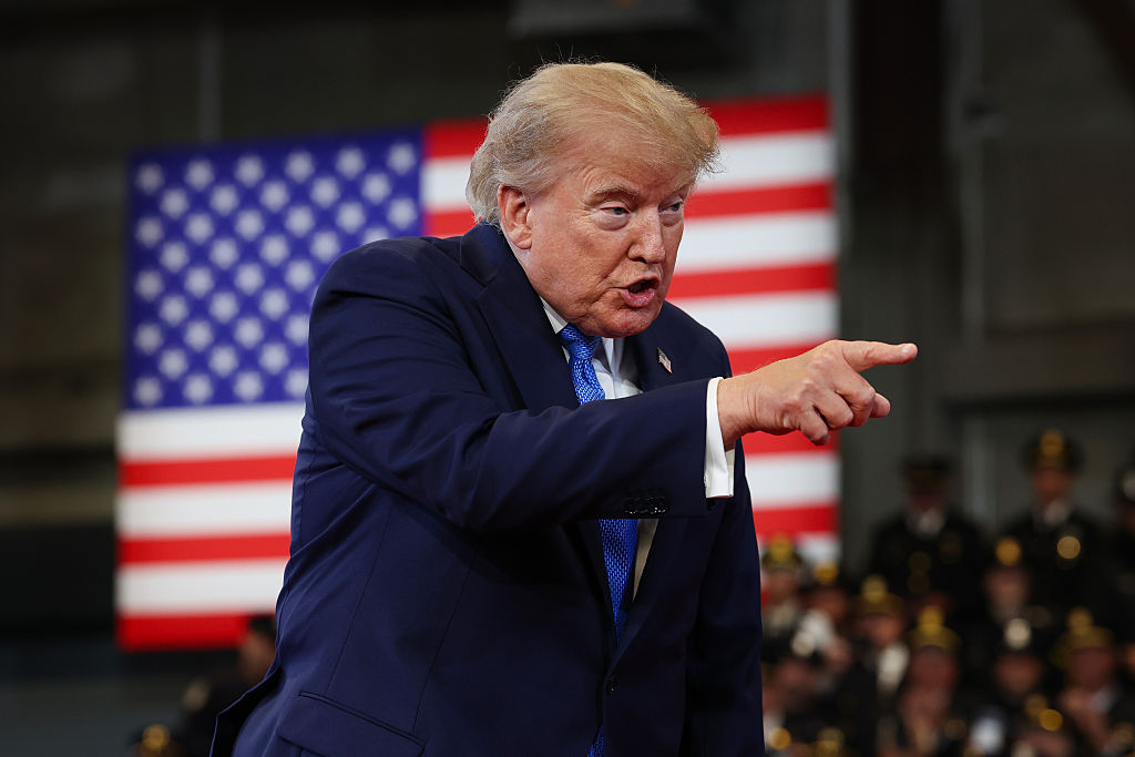 President Donald Trump arrives to deliver remarks at the David S. Mack Center for Training and Intelligence on August 14, 2026, in Garden City, New York. (Samuel Corum / Getty Images)