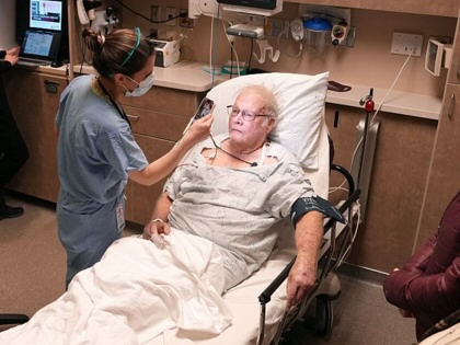 Dr Alison Raffman, a medical resident at HCMC who is spending one month doing rural ER care at Sanford Bemidji Medical Center, examines Jack Stomberg as his family looks on Wednesday, Feb. 12, 2025 in Bemidji, Minn.