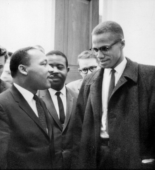 Martin Luther King Jr and Malcolm X meet before a press conference in Washington, DC, on March 26, 1964.