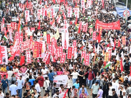 Demonstrators from various student groups, holding banners and flags, attend a protest rally in Kolkata to support the NEET protest organized by the ‘Cockroach Janata Party’ at Jantar Mantar in Delhi and the demand for the resignation of India’s education minister, Dharmendra Pradhan, on July 24, 2026 in Kolkata, West Bengal, India.