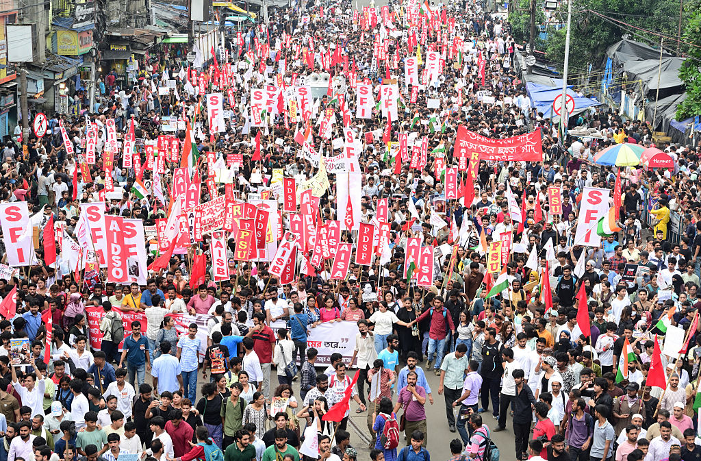 Demonstrators from various student groups, holding banners and flags, attend a protest rally in Kolkata to support the NEET protest organized by the ‘Cockroach Janata Party’ at Jantar Mantar in Delhi and the demand for the resignation of India’s education minister, Dharmendra Pradhan, on July 24, 2026 in Kolkata, West Bengal, India.