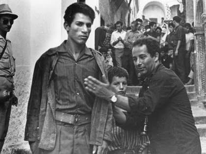 A production still from La Bataille d'Alger, featuring director Gillo Pontecorvo and lead actor Brahim Hadjadj.