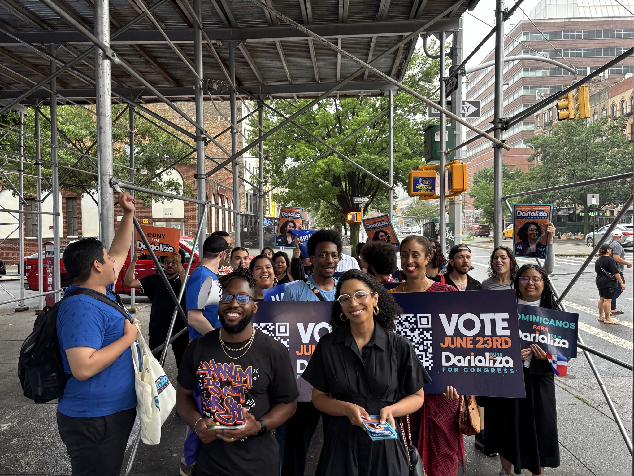 Darializa Avila Chevalier and Conrad Blackburn canvassing with supporters.