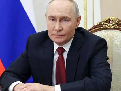 Vladimir Putin delivers a televised address to the nation ahead of the parliamentary election, from Moscow.