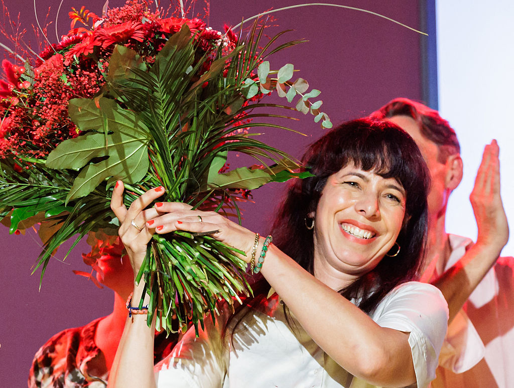 The Left Party's main candidate for the Berlin election, Elif Eralp, celebrates on stage at the electoral evening event of Germany's Die Linke party in Berlin on September 20, 2026.