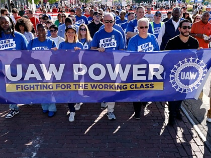Michigan Sec of State and candidate for Governor Jocelyn Benson (C), UAW President Sean Fain (4R)) and UAW Vice President Mike Booth (3R)) US Democratic Senate candidate from Michigan Abdul El-Sayed (2R) rally during Labor Day parade in Detroit, Michigan on September 7, 2026.