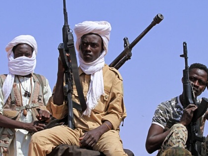 A group of armed defectors from the paramilitary Rapid Support Forces (RSF) arrive in vehicles as they are believed to be surrendering to the Sudanese military, in the west of Omdurman on August 19, 2026.