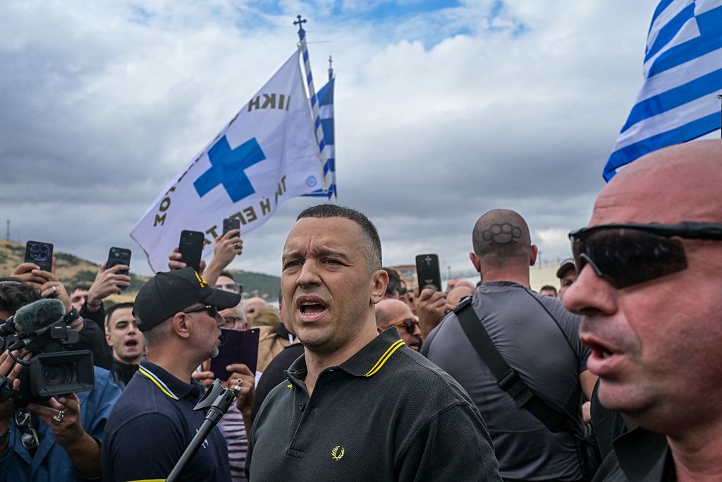 Former spokesman of Greek ultranationalist party Golden Dawn Ilias Kasidiaris speaks to his supporters after his release from the high-security Domokos Prison in central Greece on September 15, 2026.