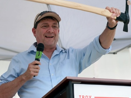 Troy Jackson holds a pulaski axe given to him during a gathering after being selected by the Maine Democratic Party to be their choice as the US Senate nominee to replace Graham Platner on the ballot in November on July 25, 2026, in Bangor, Maine.