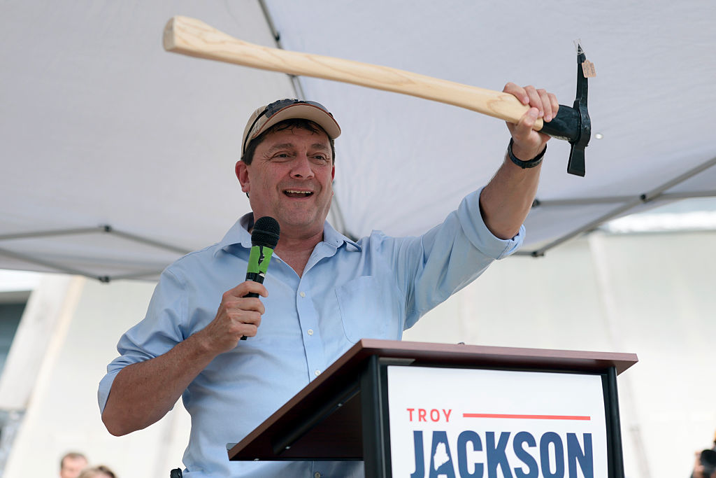 Troy Jackson holds a pulaski axe given to him during a gathering after being selected by the Maine Democratic Party to be their choice as the US Senate nominee to replace Graham Platner on the ballot in November on July 25, 2026, in Bangor, Maine.