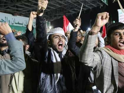 Yemenis who support the Houthis group attend a night rally, showing support for control of the Mocha port region, in Sanaa, Yemen, on September 11, 2026.