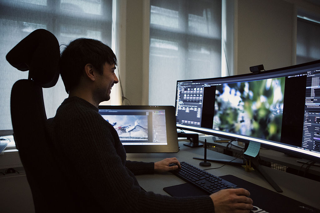 A game developer works at the Embark Studios AB offices in Stockholm, Sweden.